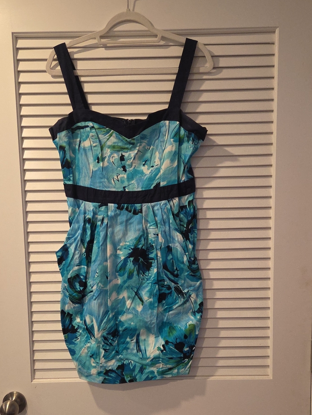 B. Smart Turquoise Floral Mini Dress with Black Trim